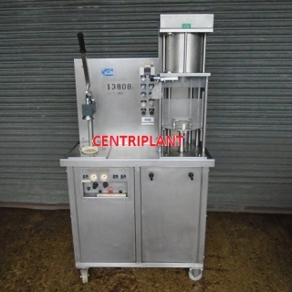 13808 - A I D PACKAGING SEMI AUTOMATIC COUNTER PRESSURE FILLER AND CROWNER