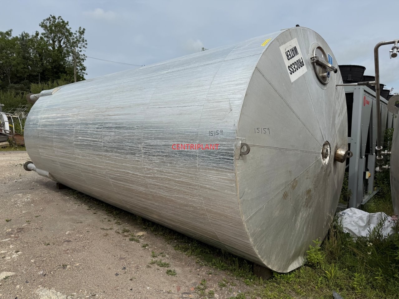 15159 - 31,000 LITRE VERTICAL MILD STEEL LINNED TANK INSULATED AND CLAD WITH ALUMIMIUM